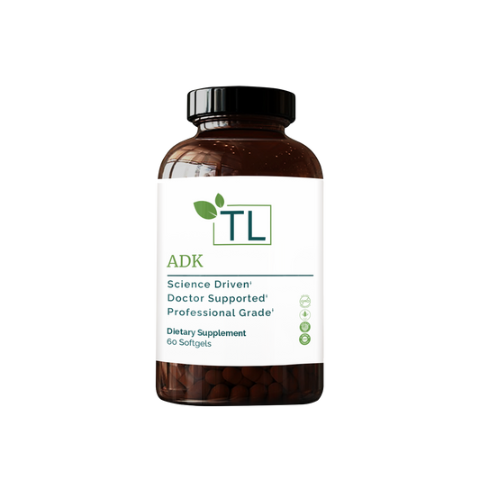 ADK supplement bottle - A blend of vitamins A, D, and K supporting bone strength, heart health, and immune function.